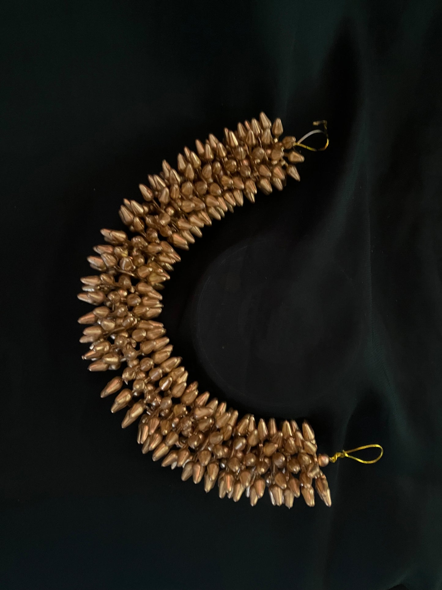 Golden bead gajra